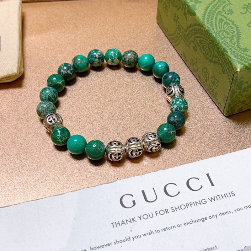 G*u*i bracelets
